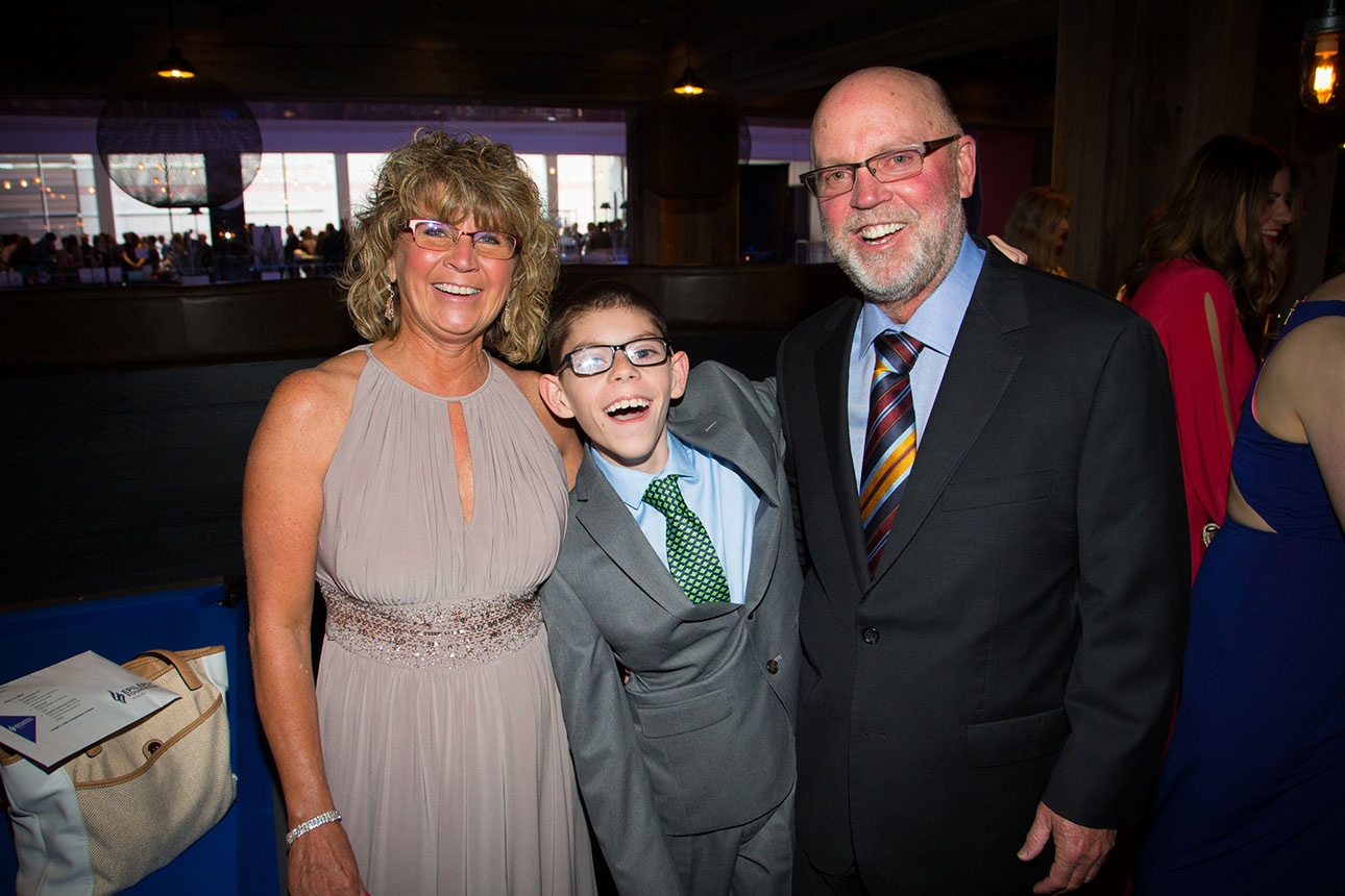 Coach Kill takes time to talk with a young admirer.