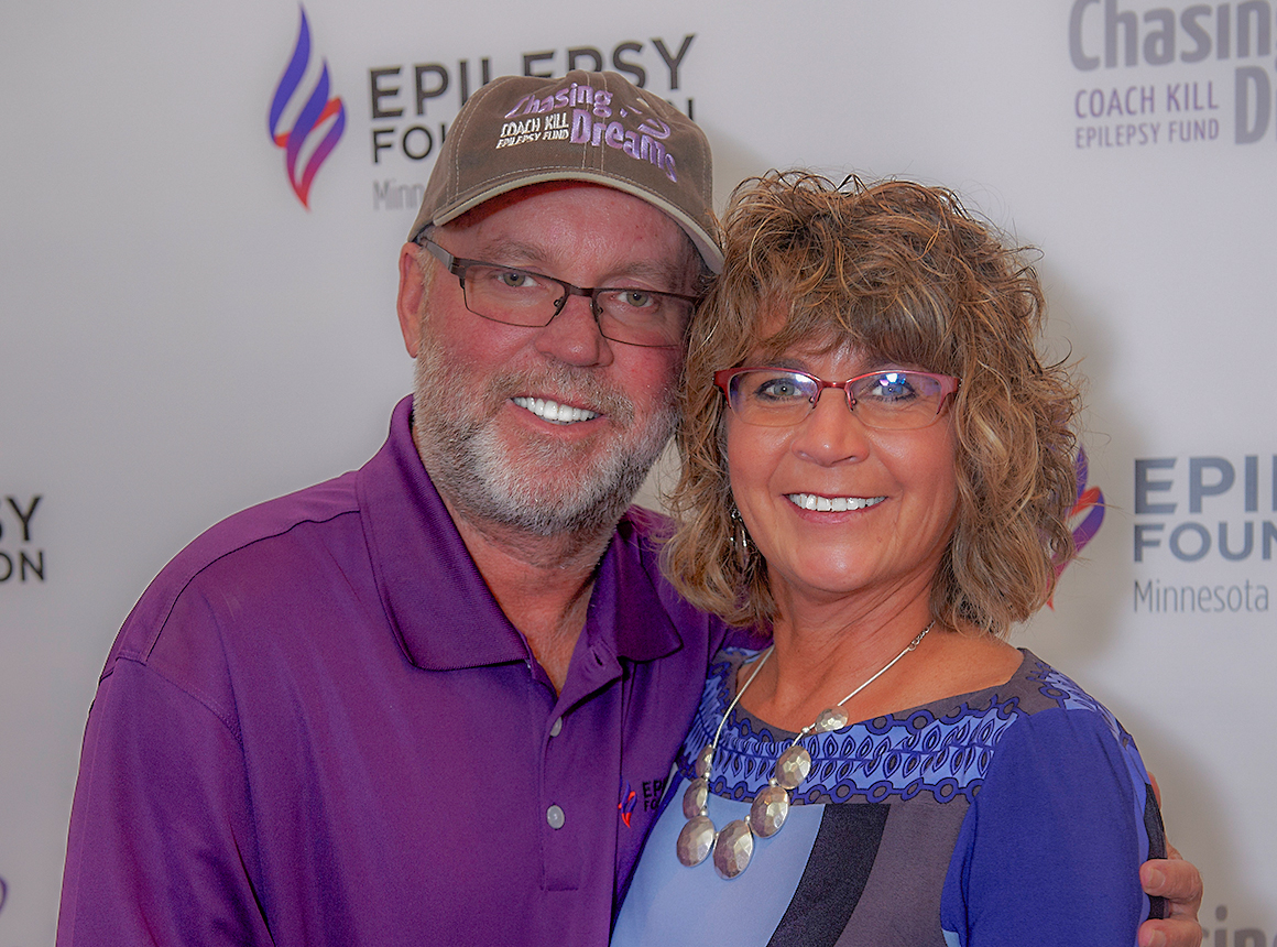 Coach Kill poses with a group of campers at Camp Oz.